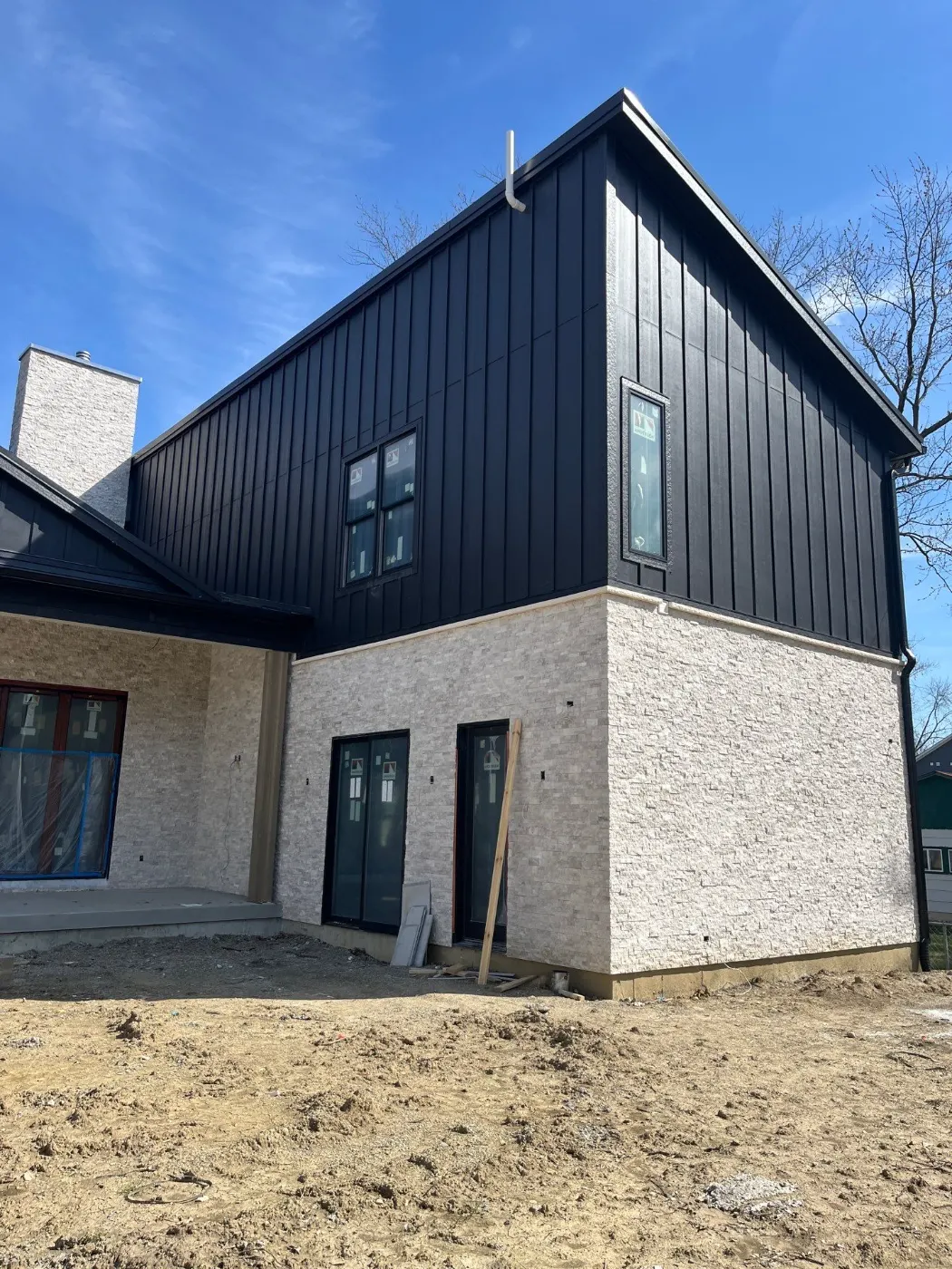 Siding installation documented in Lakestone Bridge